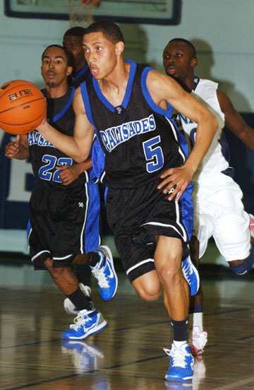 Adam Griffin (5) drives down the lane against Venice on January 14. Griffin had eight points in last Wednesday's 69-68 home loss to University. Rich Schmitt/Staff Photographer